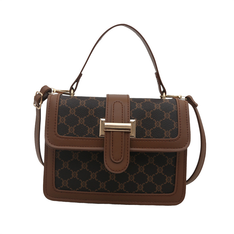 2025 nueva moda simple de alto valor de cara bolso de hombro de moda retrógrada impresión de personalidad bolso de viaje portátil pequeño