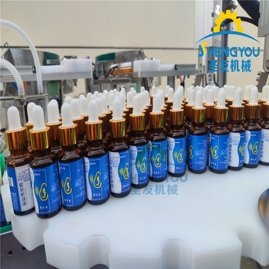 圣友全自动精油4分头灌装机 全自动精油灌装设备 精油灌装贴标机
