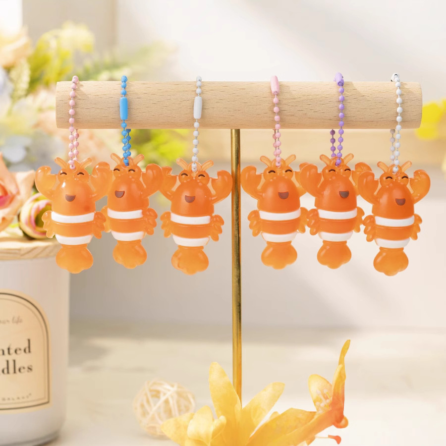 B Colgante de pollo, pato y pescado que cambia de color, sensor de luz, cambio de color, UV, protector solar creativo para automóvil, pequeño libro rojo, el mismo estilo, estilo caliente