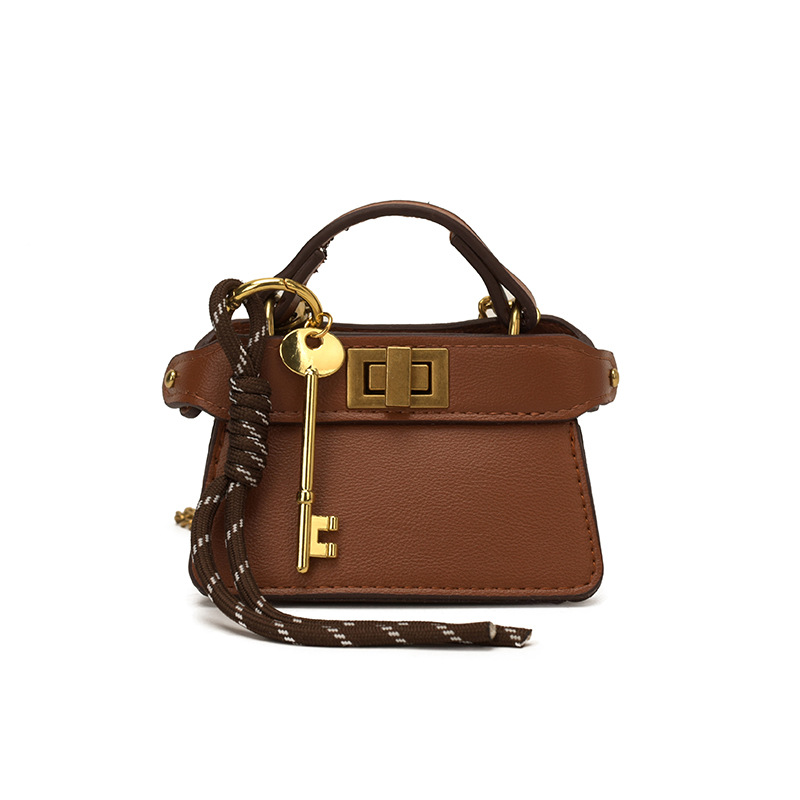 Coreano simple bolso de niña de color sólido mini bolso de bebé 2026 bolso para niños de comercio exterior transfronterizo