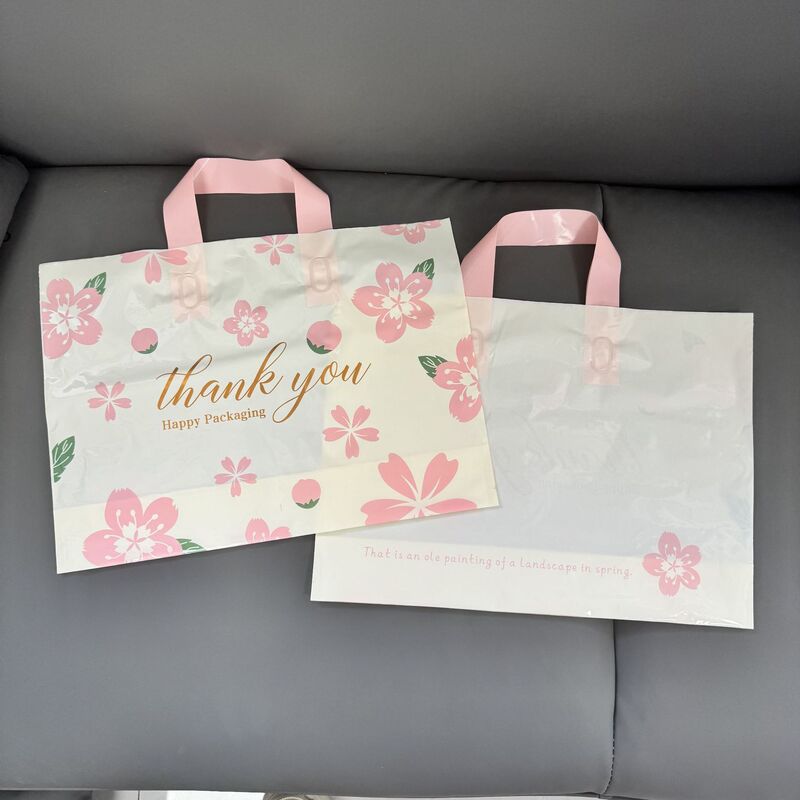 好看的花朵塑料女装衣物服装店用手提袋子包装购物礼品节日礼品袋|undefined