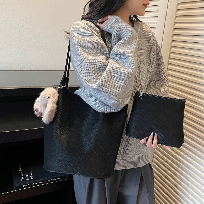 2025 nuevo bolso de mujer coreano retro bolso de cubo de mano nicho bolso de tejido de gran capacidad de viaje de hombro bolso de madre