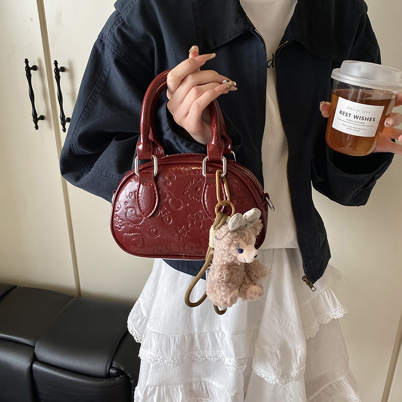 Nicho de diseño de bolso de mano de alta calidad para mujeres 2025, nuevo estilo de moda universal para viajar ocio simple bolso de mochila