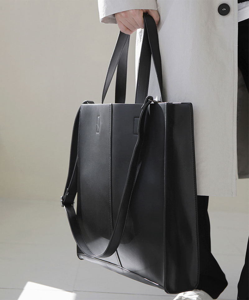 Korean version of fashionable PU leather shoulder bag, simple commuter men's and women's tote bag, square vertical crossbody large-capacity handbag_voghion.com