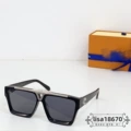 Black frame, gray lenses, silver logo