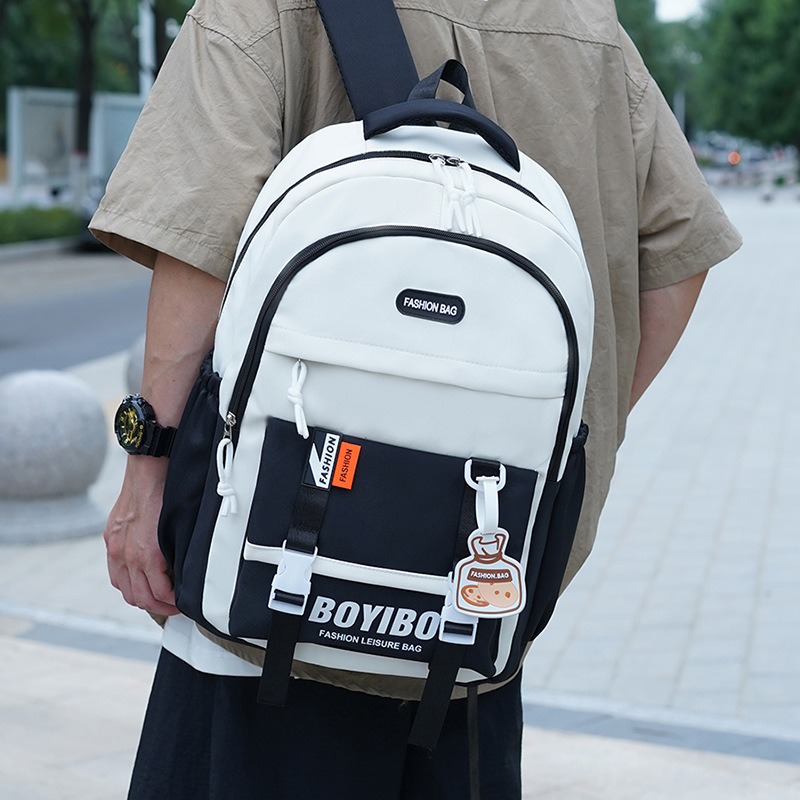 Nueva tendencia de la moda color de contraste mochila de gran capacidad impermeable para estudiantes universitarios de secundaria y preparatoria mochila de viaje ligera al por mayor