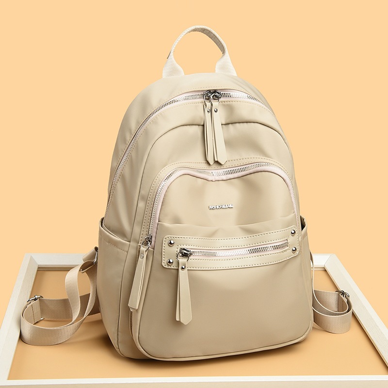 Mochila de comercio exterior mochila de hombro a prueba de agua ocio 2026 bolsas de mujer impermeables a prueba de agua tendencia de calle beige
