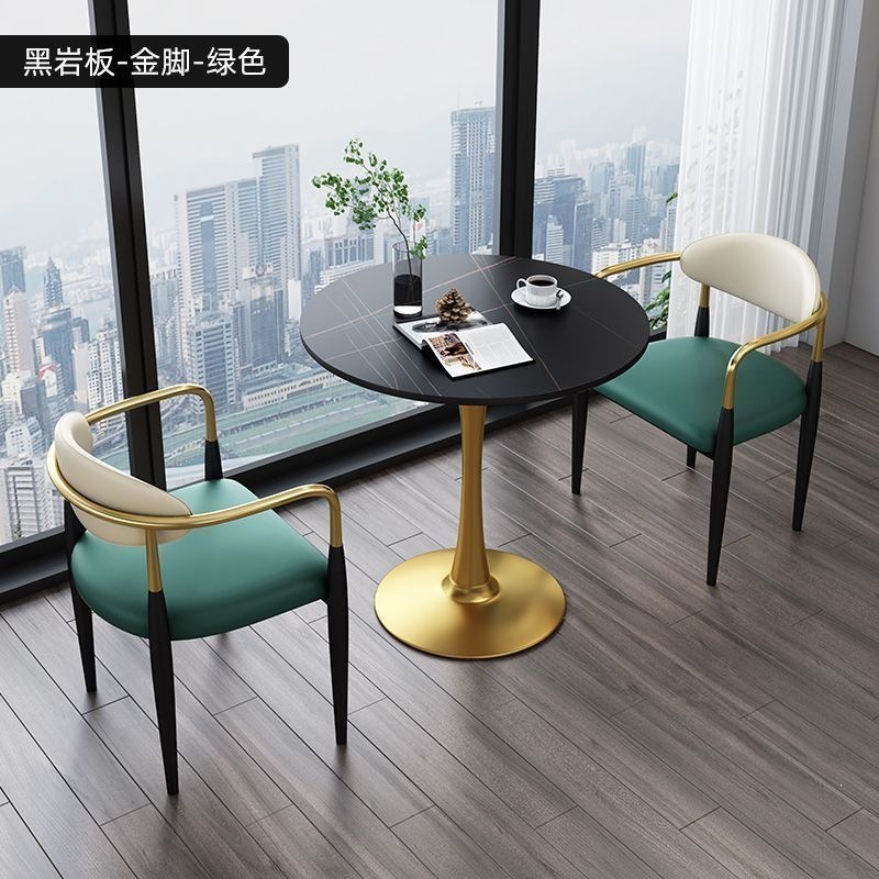 Gold legs + black rock slab + green leather, one table and two chairs