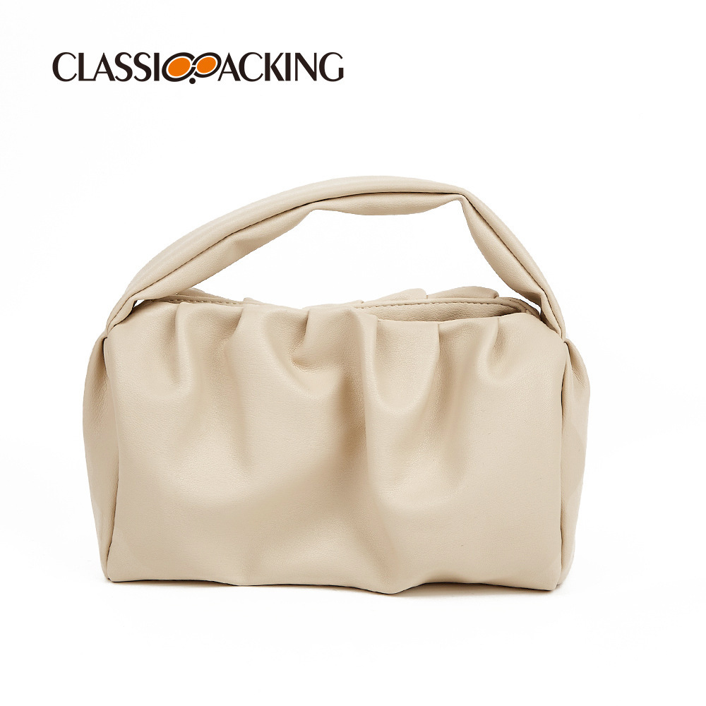 Bolso de nube simple japonés, textura ins, bolso de mujer de color sólido, moda, bolso de mano de celebridad de Internet, bolso de cosméticos