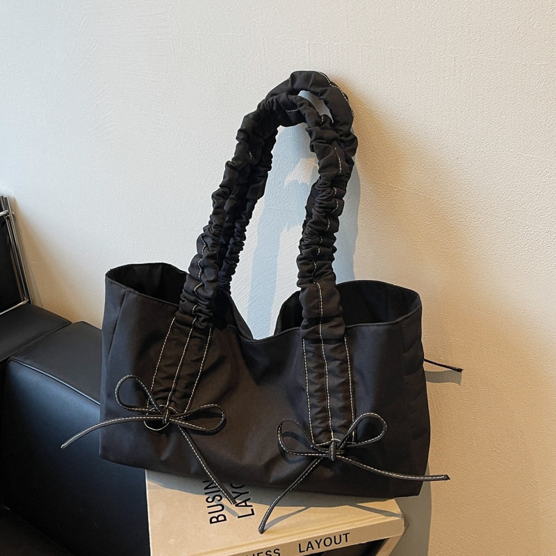 Bolsa de hombro de nicho coreano, bolso de viaje de arco, bolso de mano de mujer, bolso casual de gran capacidad, simple.