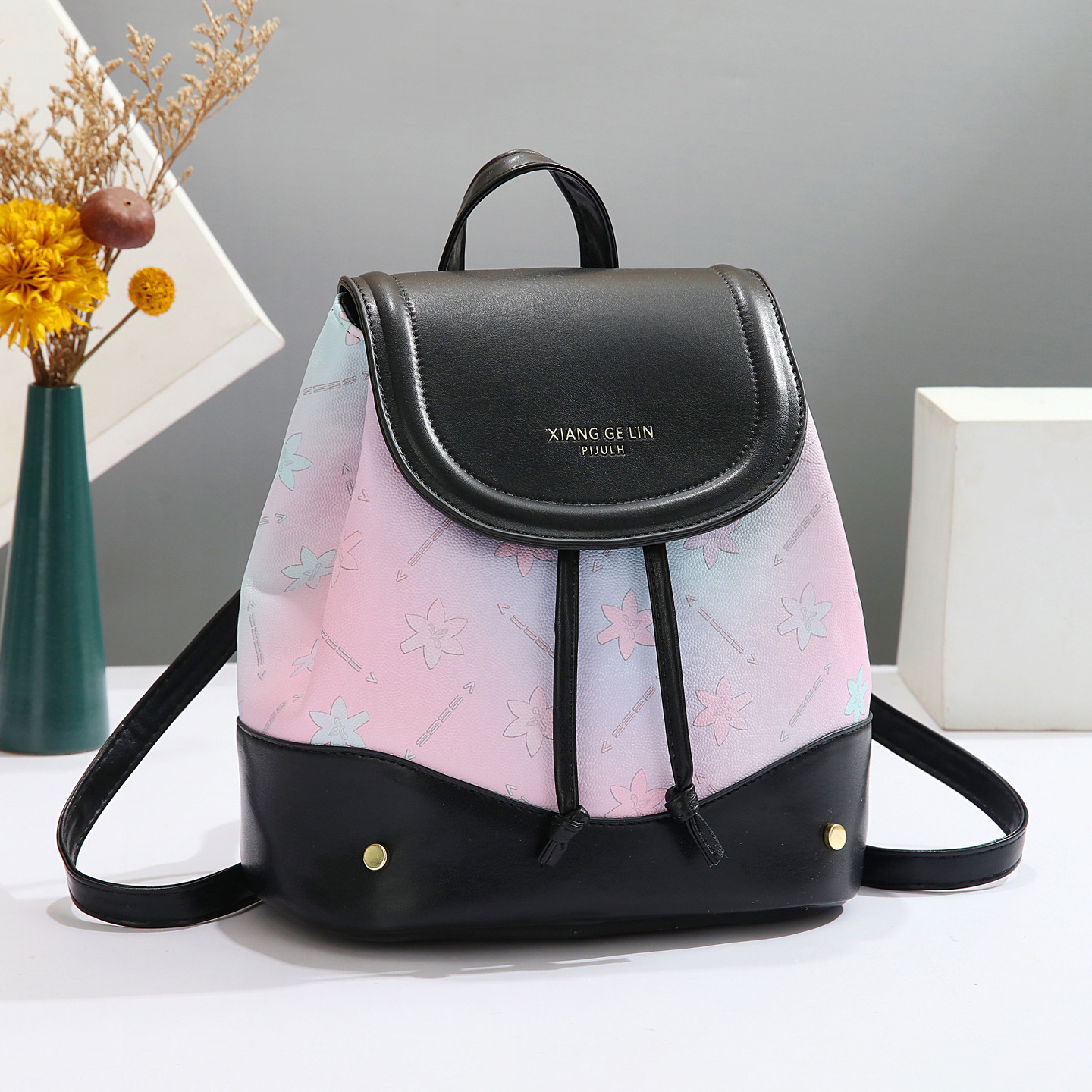 2025 nueva mochila de estilo universitario de moda de moda de impresión de moda de mujeres mochila de verano simple versátil mochila de estudiantes