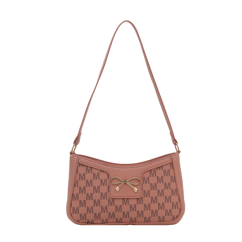 Cosmetía coreana estilo de moda textura arco de moda primavera 2025 nuevo estilo extranjero de viaje brazo bolso de hombro para mujeres