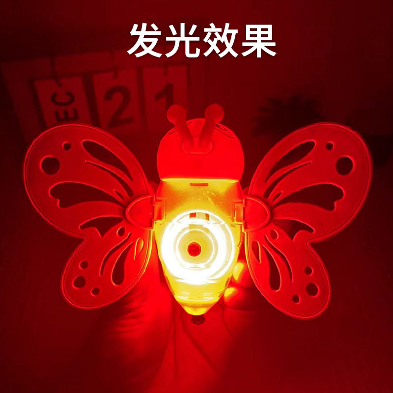 Juguetes de dibujos animados para niños abejas de cuerda de tracción mariposas flash jardín de infantes pequeños regalos al por mayor