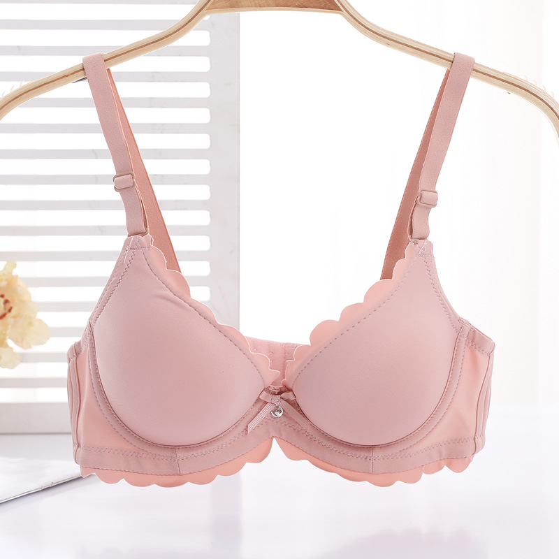 Fábrica de sujetadores de Shantou en stock brillante sin marcas de grosor pequeño sujetador de ropa interior para mujeres ajustable soporte superior para evitar caída