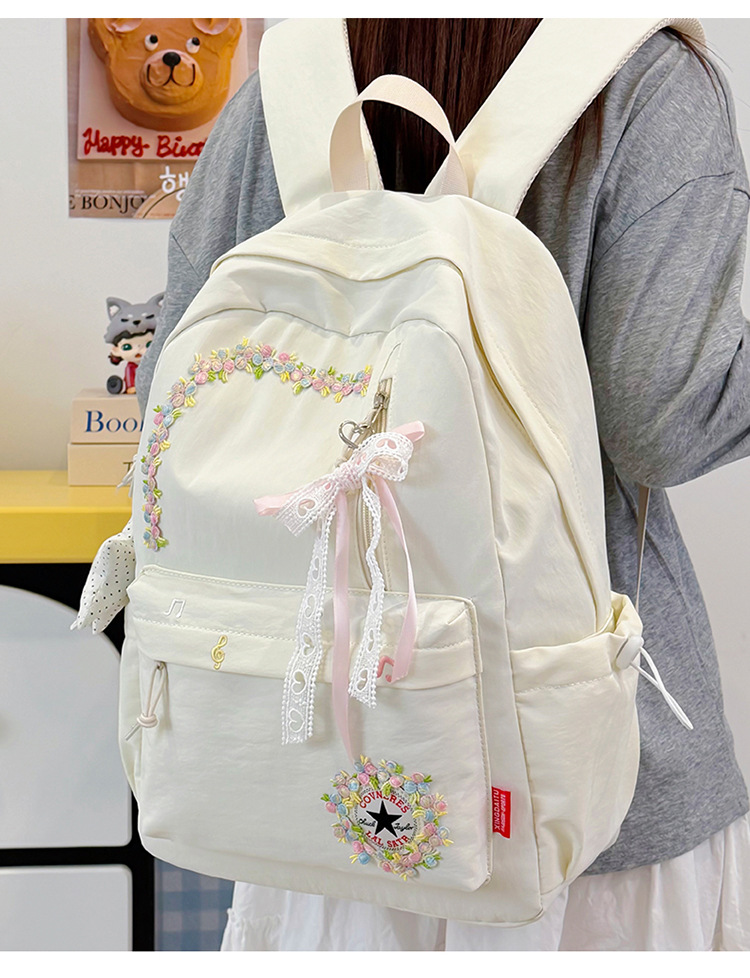 Neue grenzüberschreitende Freizeit-Trend-Rucksack mit Blumenmuster hochwertige leichte Schultasche großes Fassungsvermögen beliebter Campus-Rucksack