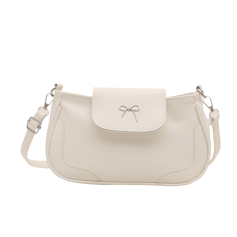 Bolsa de viaje retro para mujeres 2025, nueva moda, bolso de brazo de arco de moda, bolso de brazo elegante y dulce.