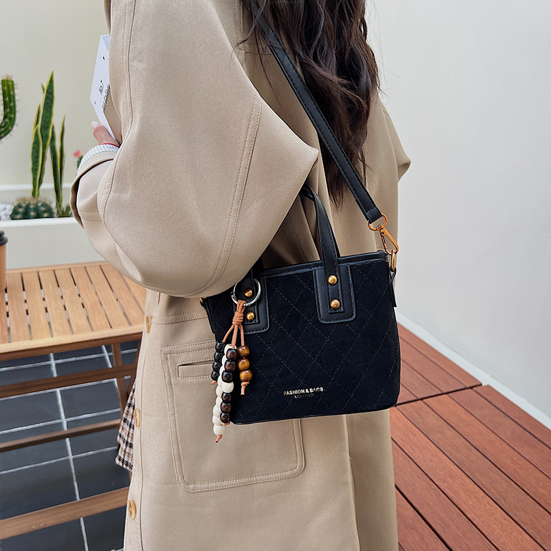 Transfronterizo retro gamuz bolsas de cubo de mano para mujeres 2025 nuevo estilo universal