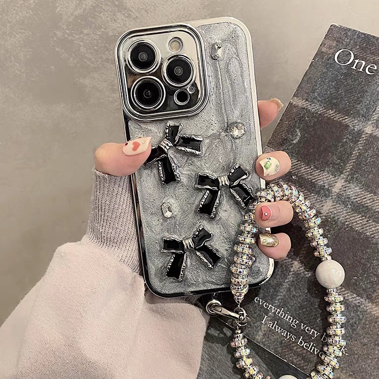 ins風小眾電鍍閃粉寶石蝴蝶結手機殼適用iPhone15ProMax手鍊鏈條