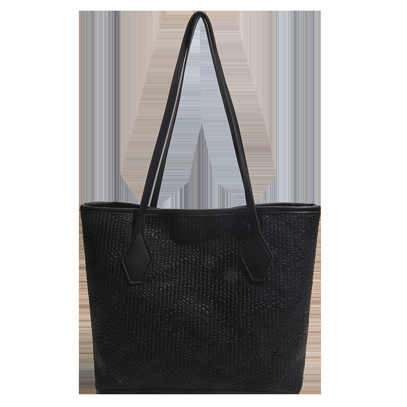 Bolsa de gran capacidad para mujeres 2026 nuevo estilo extranjero tejido de hombro brazo bolso de mano para salir bolsa de viaje