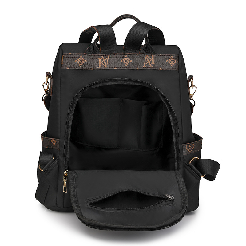 Comercio exterior al por mayor 2024 nueva mochila antirrobo de nailon para mujer retro, mochila multifuncional de doble uso de color de contraste de moda