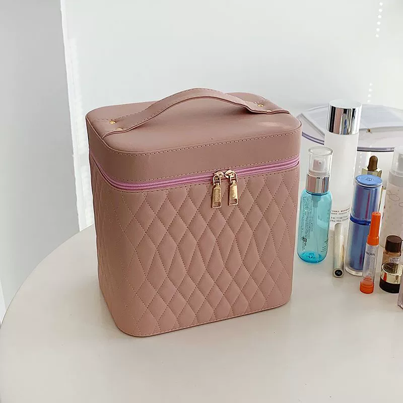 Capacious handheld cosmetic bag for traveling, storage box