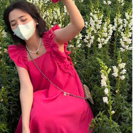 法式设计感显瘦露背沙滩裙女夏季新款三亚海边旅游度假无袖连衣裙