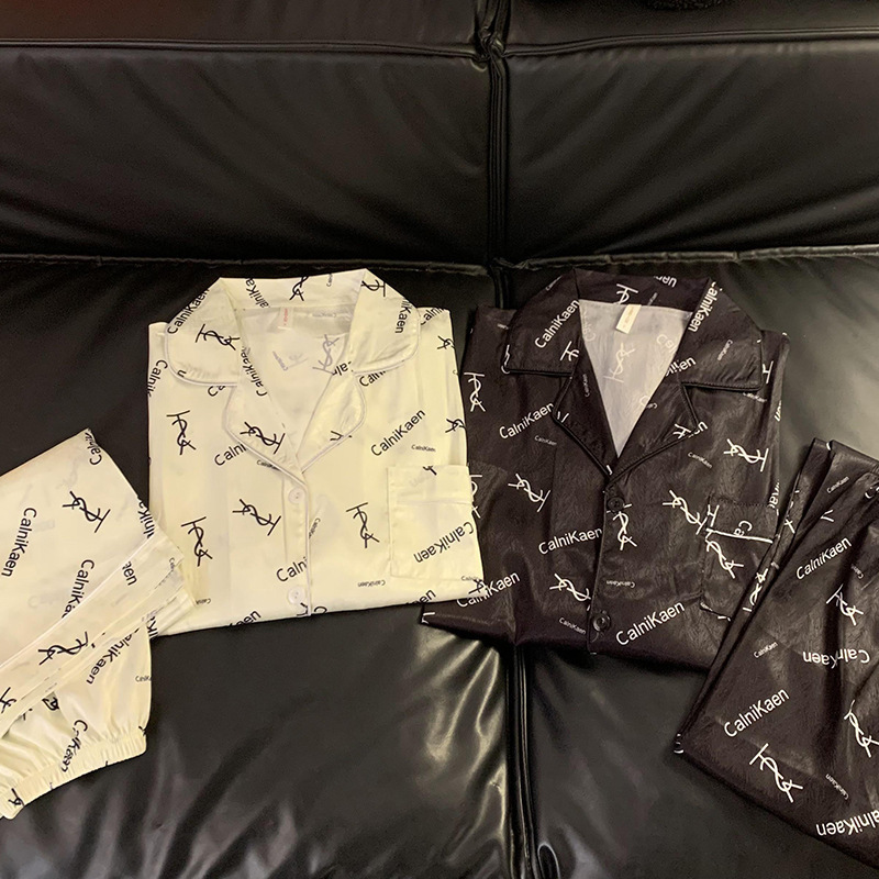 Par de pijamas de primavera y otoño delgada de seda de hielo de manga larga de alto sentido 2024 Nuevo más tamaño de los hombres y las mujeres de verano homewear traje