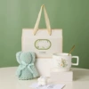 Tower, spoon, towel, gift box