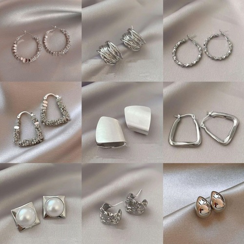 Geometric silver metal earrings for women, elegant and light luxury, unique design, high-end feel, cold-style earrings and earring accessories