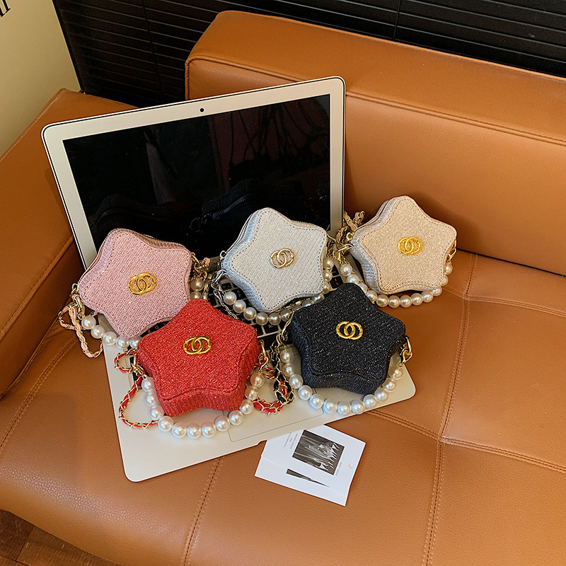 2026 nuevo bolso de niños brillante estrella de pentacos bolso de perla exquisito mini bolso accesorios para hombres y mujeres