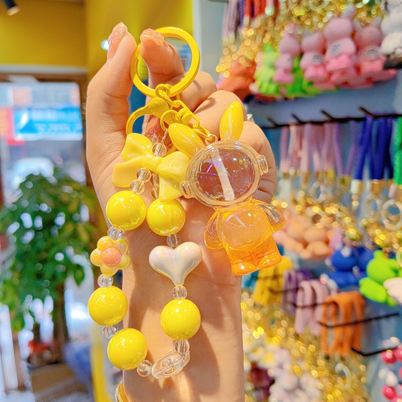 Auriculares de perlas conejo - naranja amarilla