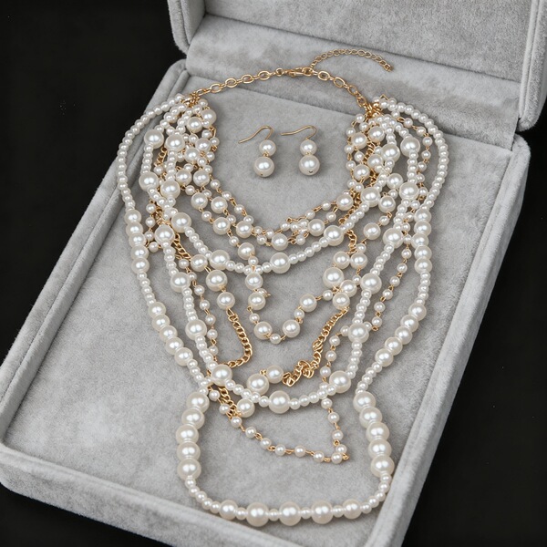 fashionable necklace and earrings from pearl