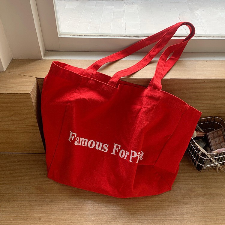 한국 Ins 틈새 디자인 게으른 캐주얼 스타일 대용량 레드 숄더 통근 올 매치 캔버스 가방 두꺼운