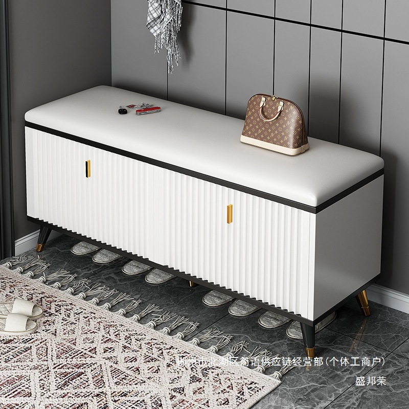 Fábrica directa de cambio de zapatos taburete zapatos gabinete integrado puerta de entrada se puede sentar bolsa de lujo suave asiento taburete puerta de almacenamiento doméstico