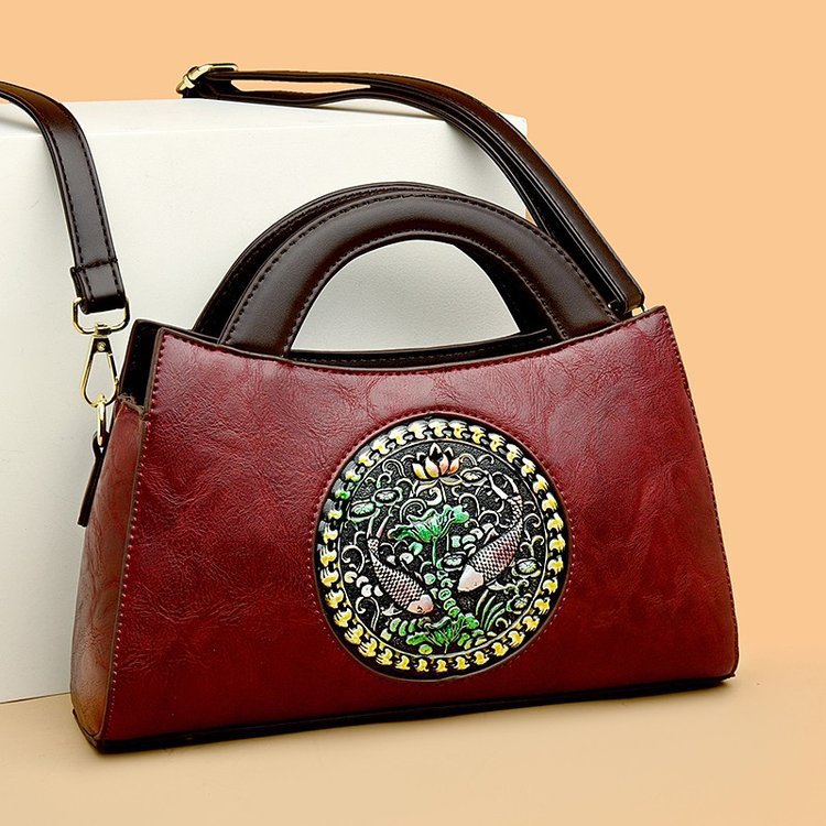 Bolso de mano de mujer mujer 2024 nueva moda atmósfera bolso de madres de mediana edad moda versátil simple bolsas de hombro