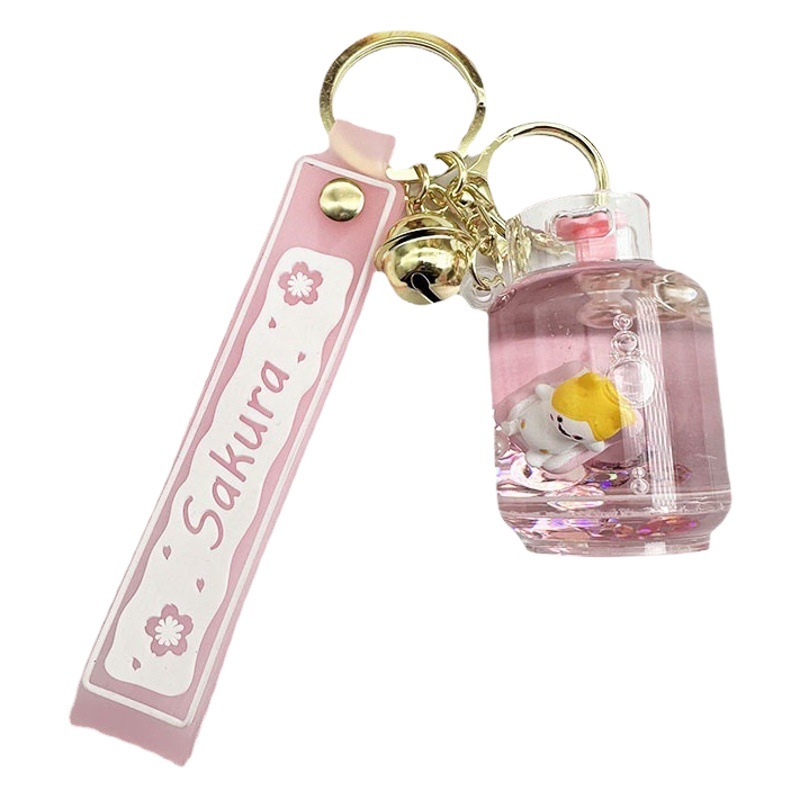 Señora acrílico nicho diseño sentido de alta gama aceite flotante sofá gato tanque de gas llavero chica de gama alta