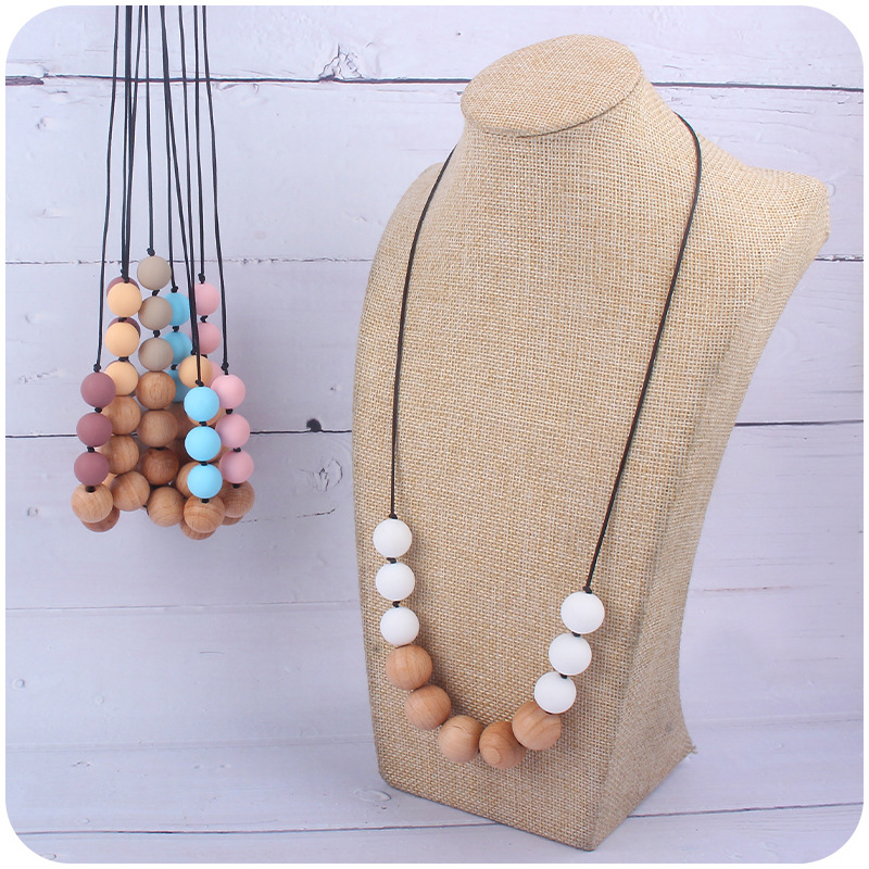 Nuevo bebé suministros silicona molar teether collar bebé teether palo masticable colgante collar