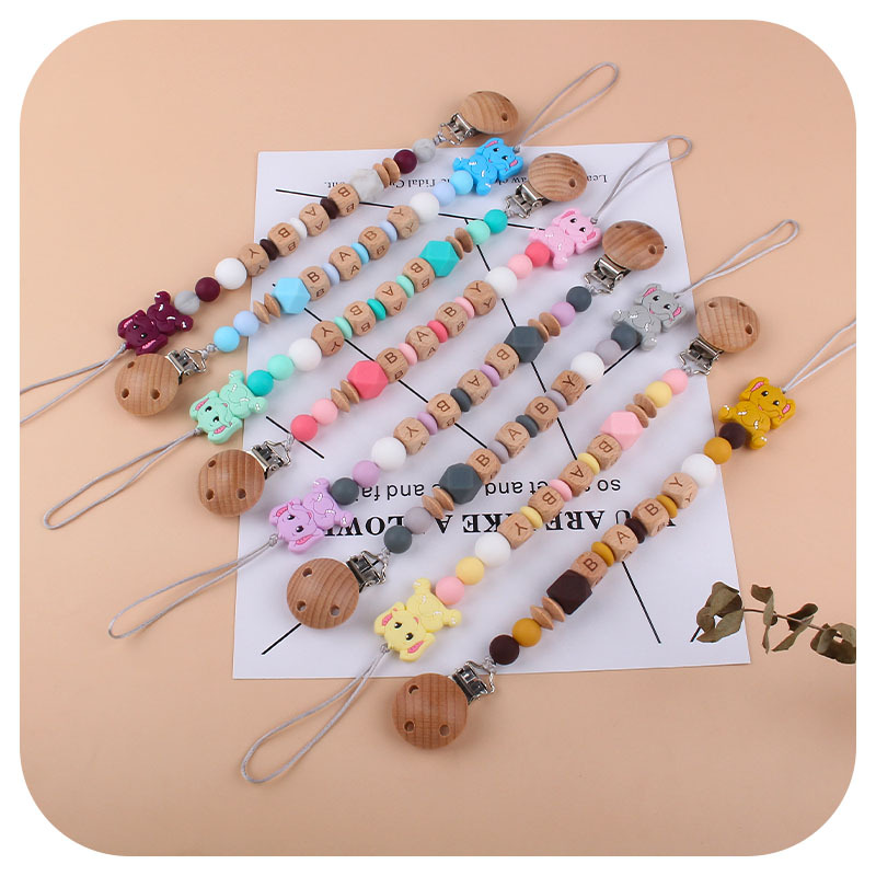 Bebé de dibujos animados elefante de silicona teether stick teether nuevo nombre del bebé pezón cadena anti-caída