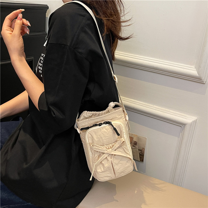 Korean Style Crossbody Bag for Women 2025 New Simple Bow Kettle Bag Casual Outing Mobile Phone Bag Versatile Water Cup Bag