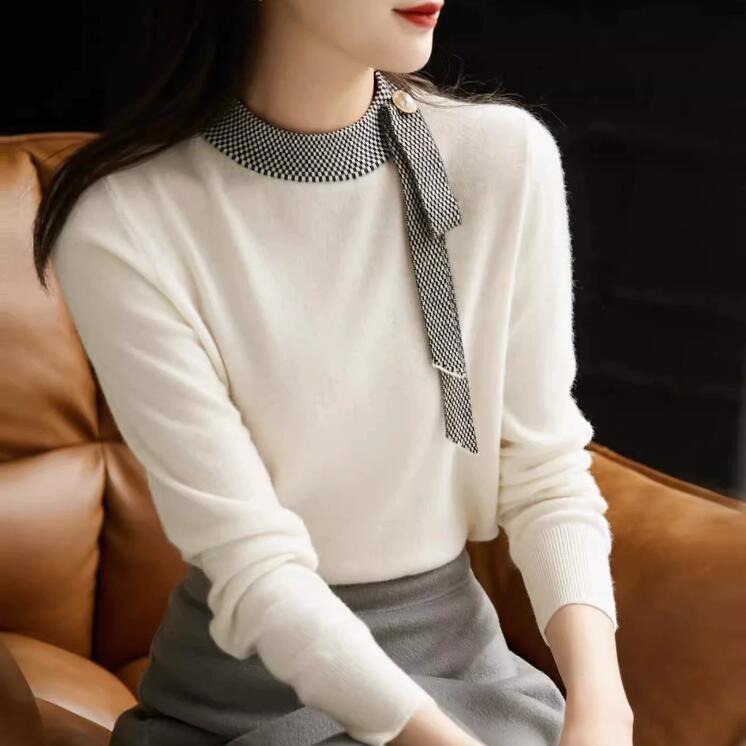 Elegant woolen knitted demi-season base sweater with a round collar