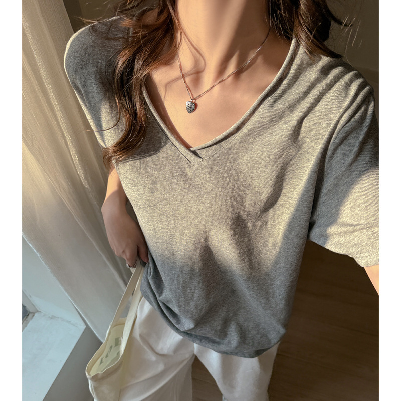 Selección estricta coreana suelta camiseta de mangas cortas mujeres primavera y verano con cobertura de carne para adelgazar se puede usar hombro en V cuello camiseta de base superior