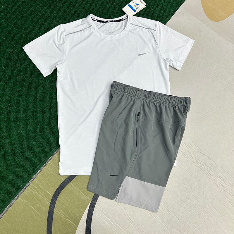 Mayorista nuevo juego de comercio exterior deportivo fitness juego de carrera rápida secado transpirable suelto ocio pantalones cortos de manga corta ropa de hombre