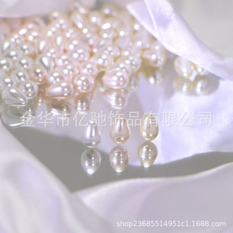 Imitación transfronteriza de perlas de casa imitación de conchas de agujero recto gotas de agua cuentas dispersas DIY accesorios de joyería pendientes colgantes para el cabello al por mayor