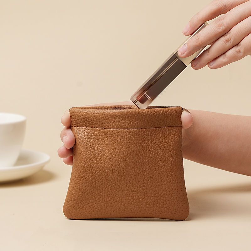 New Genuine Soft Leather Spring Earphone Automatic Tight Storage Bag Wireless Earphone Data Cable Portable Coin Purse