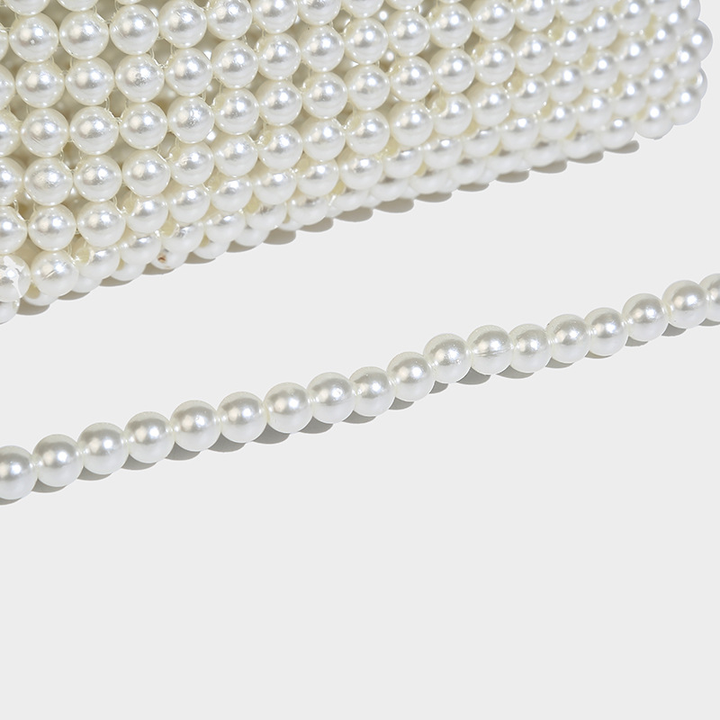 Perlina in stile francese Ins con design cavo, dolce ragazza versatile perla tenuta in mano, croce diagonale a spalla singola intrecciata a mano_voghion.com