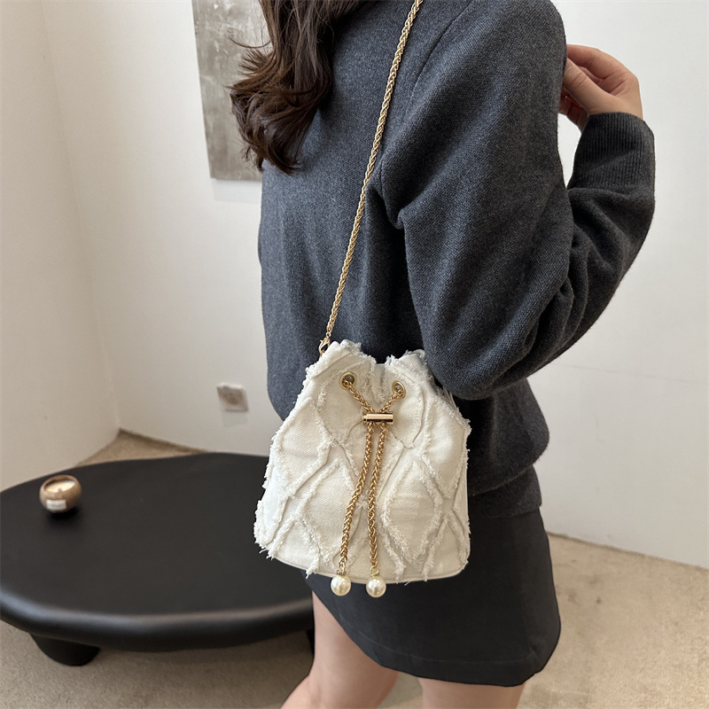 Nicho de diseño bolso de cubo otoño 2024 nuevo bolso de cordón de dibujo bolso de mujer mochila de moda simple bolso de hombro