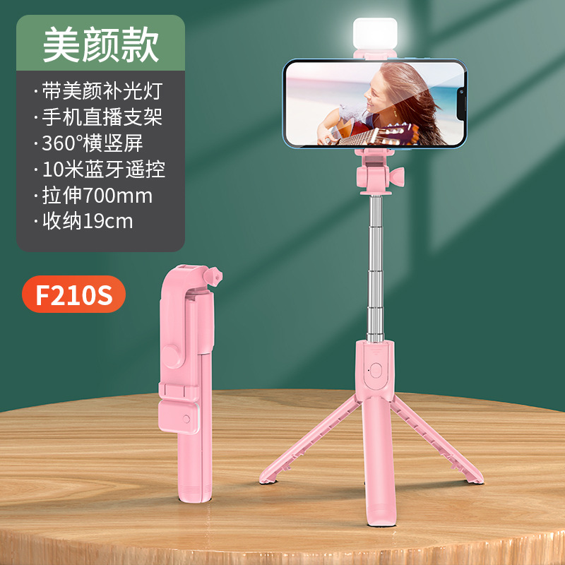 Ventas directas de fábrica teléfono móvil Bluetooth selfie stick trípode llenar luz selfie stick mini portátil de mano Cámara artefacto