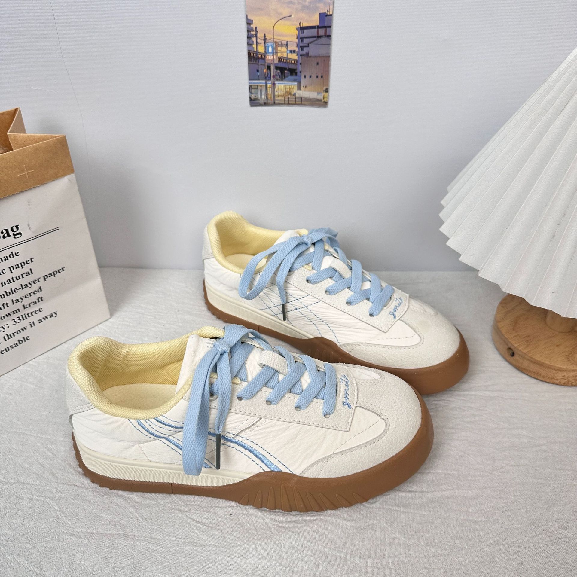Diseño de onda lejana, suela gruesa, zapatos de entrenamiento alemanes, primavera de 2025, nuevas zapatillas de deporte casuales retro cómodas y versátiles para mujeres