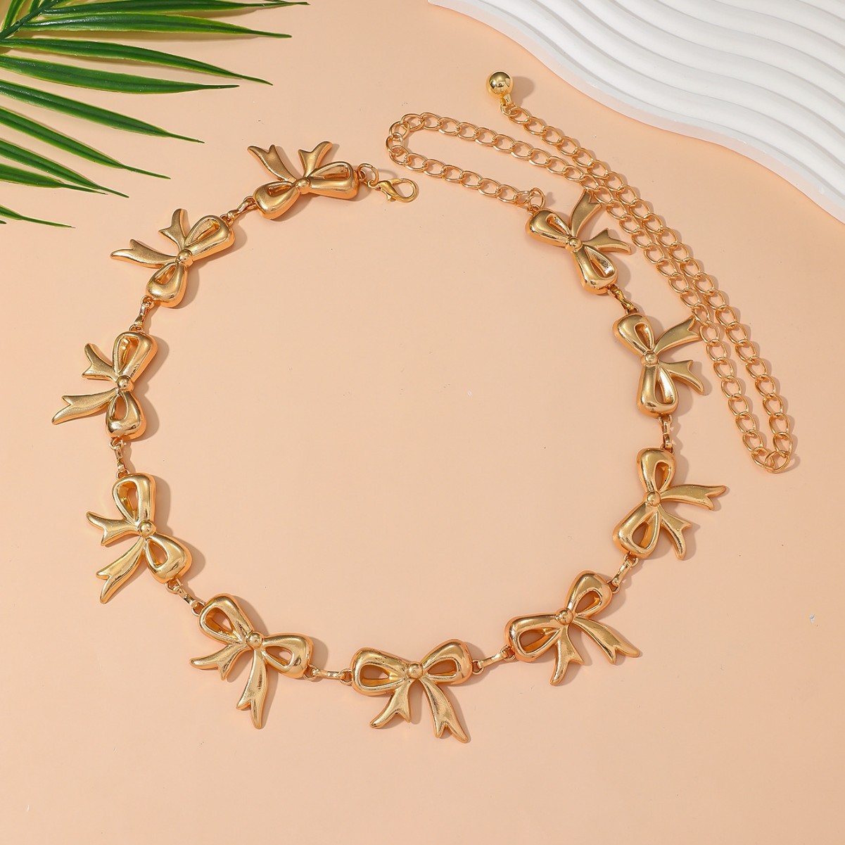 Catena per la vita, catena per il corpo, stile retrò dorato, accessorio con fiocco per la vita da abbinare a gonne, cintura a catena in metallo per l'estate e la spiaggia._voghion.com