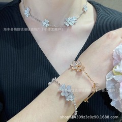 Vゴールドメッキ金クローバー花ネックレスCNC高版ドリルブレスレットセット高級典雅工場直販